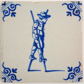 Antique Delft tile with a child walking stilts, 17th century