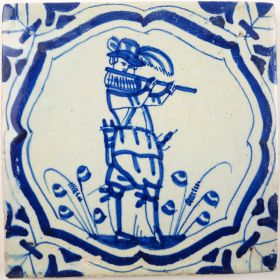 Antique Delft tile depicts a flautist, 17th century