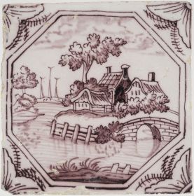 Antique Delft tile with a village, 18th century