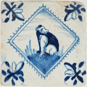 Antique Delft tile with a dog, 17th century