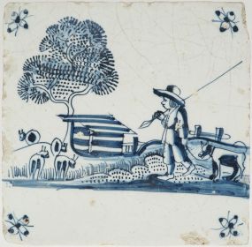 Antique Delft tile with a shepherd, 17th century