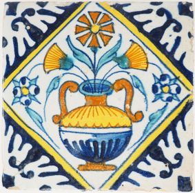 Antique Delft tile with flowerpot in diamond square and reserve-painted corners, 17th century 