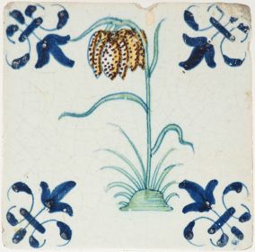 Amtique Delft tile with fritillaria and lily corners, 17th century
