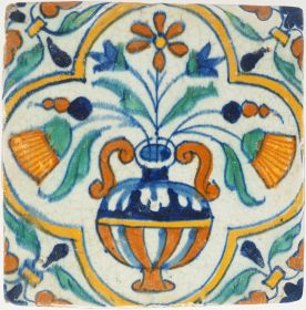 Antique Delft tile with polychrome flower vase and winged leaf corners, 17th century