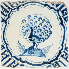 Antique Delft tile with blue peacock in scalloped border, 17th century