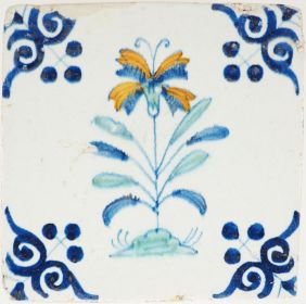 Antique Delft polychrome tile with orange and blue flower, 17th century