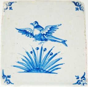 Delft tile with bird flying up from grass, 17th century