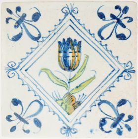 Antique Delft tile with polychrome tulip in diamond square, 17th century