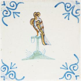 Antique Delft tile with polychrome bird of prey, 17th century