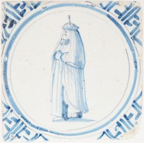 Antique Delft tile with woman in huik, 17th century