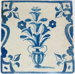 Antique Delft blue with a flower vase, 17th century