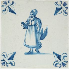 Antique Delft tile with a maid returning from the market, 17th century