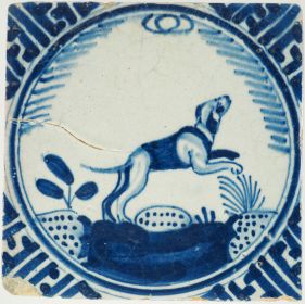 Antique Delft blue crown tile with a hunting dog, 17th century