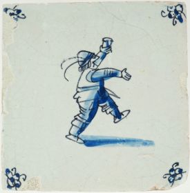 Antique 17th-century Delft wall tile in blue with a man holding a glass, 17th century