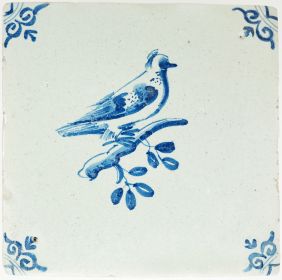 Antique Delft tile with a bird on a branch in blue, 17th century