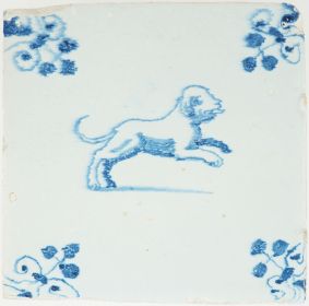Antique Delft tile with a leaping dog in blue, 17th century