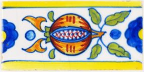 Antique Delft polychrome border tile with pomegranates, 19th century