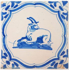 Antique Delft tile in blue with a billy goat resting, 17th century