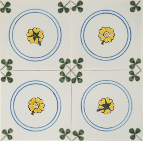 Classic hand-painted Delft tiles with colourful buttercups - decorated with clover corner motif