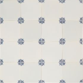 Ox-head corner motif Delft tile (PCM-20) in traditional blue, hand-painted with refined detailing. Shown with pinholes but no crackled finish.