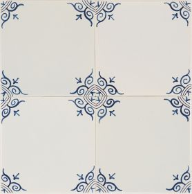 Large ox-head corner motif Delft tile (PCM-21) in traditional blue, hand-painted on the grey mix with pinholes but no crackled finish.