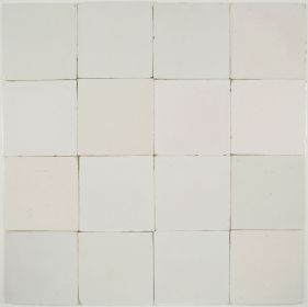 Plain white Utrecht Delft wall tiles with soft off-white tone (18th–19th century)