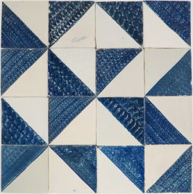 Antique Delft tile with half-glazed blue design from the 18th–19th century, known as ‘halves’ - A