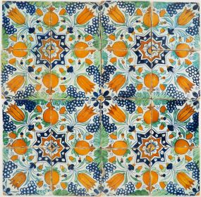 Early 17th-century Delft wall tiles forming a Star Tulip pattern in blue, orange and green