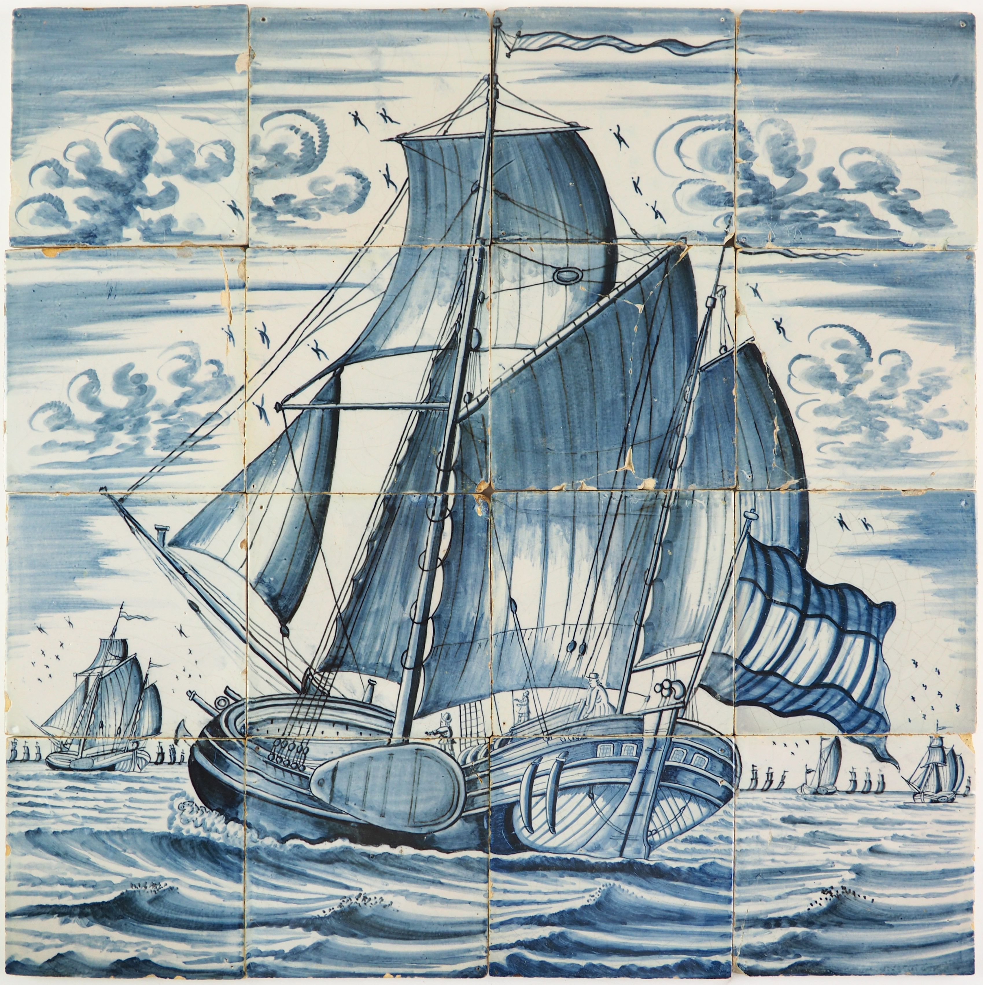 Antique Delft tile mural in blue depicting a koff ship under sail
