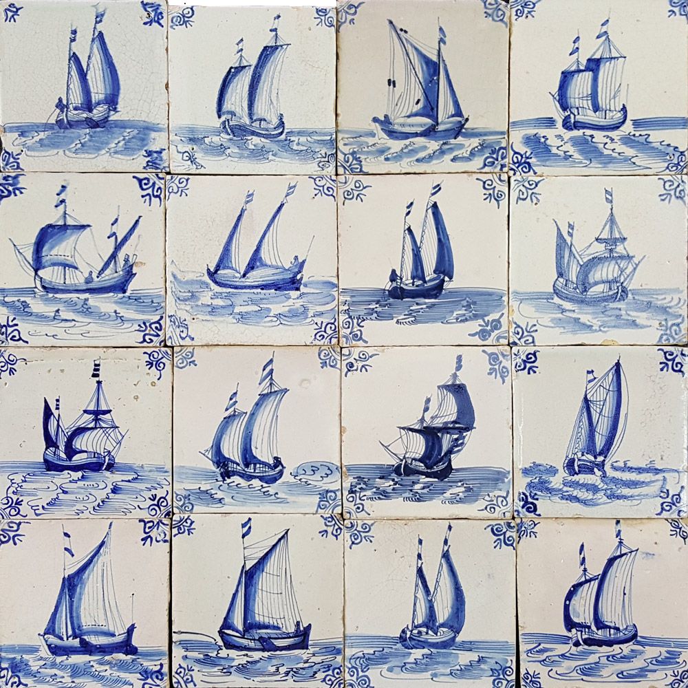 Antique Dutch wall tiles in blue with ships and boats from