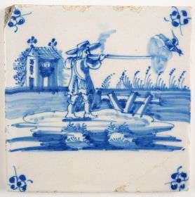 Antique Delft tile with a hunter shooting a duck, 18th century