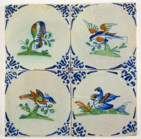 Set of four Delft tiles with colorful birds, 17th century Gouda