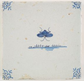 Antique Delft tile with a butterfly, 17th century
