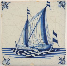 Antique Delft tile with a cargo vessel under sail, 17th century