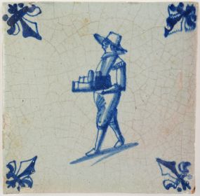 Antique Delft tile with a peddler, 17th century 