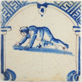 Antique Delft tile with a man playing a game of curling, 17th century