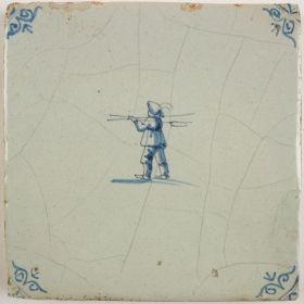 Antique Delft tile with a farmer, 17th century