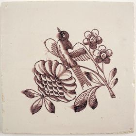 Antique Delft tile with a bird between flowers, 18th century