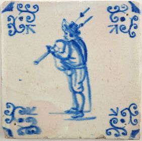Antique Delft tile with a man playing bagpipes, 17th century