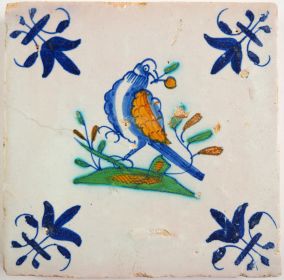 Antique Delft tile with a polychrome bird, 17th century