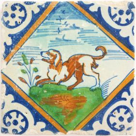 Antique Delft tile with a polychrome dog, 17th century
