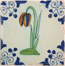 Antique Delft tile with a snake's head, 17th century