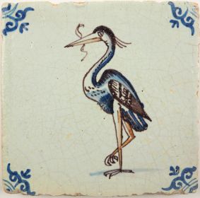 Antique Delft tile with a polychrome heron, 17th century