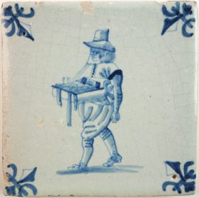 Antique Delft tile with a pedlar, 17th century