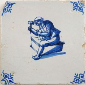 Antique Delft tile with a coffin maker, 17th century
