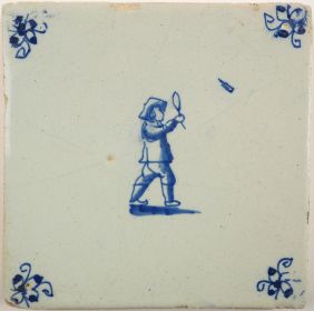 Antique Delft tile with a ball game, 17th century