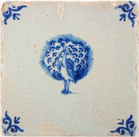 Antique Delft tile with a peacock, 17th century