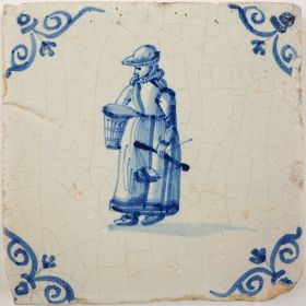Antique Delft tile with a market vendor, 17th century