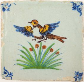 Antique Delft tile with a hunted bird, 17th century