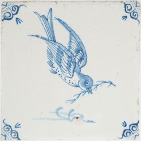 Antique Delft tile with a bird in flight, 17th century
